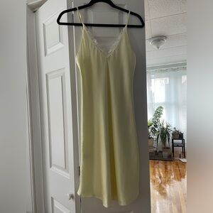 Pale yellow slip dress with lace trim